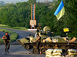 Между украинскими военными и сторонниками федерализации под Славянском и Краматорском идет перестрелка "из гаубиц и минометов"