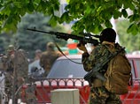 Вооруженные люди, входящие в таинственный батальон "Восток", который выступает на стороне самопровозглашенной "Донецкой народной республики" (ДНР), "зачистили" здание Донецкой облгосадминистрации (ОГА) от представителей ДНР Вооруженные люди, входящие в таинственный батальон "Восток", который выступает на стороне самопровозглашенной "Донецкой народной республики" (ДНР), "зачистили" здание Донецкой облгосадминистрации (ОГА) от представителей ДНР