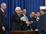 Церемония прошла в резиденции палестинского лидера "Мукатаа" в городе Рамалла на Западном берегу реки Иордан