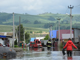В Сибири продолжается наводнение, которое уже унесло несколько жизней и ущерб от которого еще только предстоит оценить