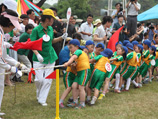  Маленькие жители КНДР показывали свои спортивные и художественные навыки в парке аттракционов Мангендэ в столице страны Пхеньяне