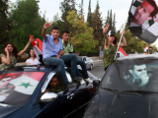 Пальбой в воздух и криками "Да здравствует Башар!" встретили сирийцы объявление итогов выборов
