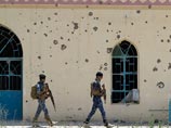 Как только гражданских вывезли на автобусах, военные Ирака начали стрельбу по зданиям с целью изолировать на территории кампуса в Рамади боевиков Как только гражданских вывезли на автобусах, военные Ирака начали стрельбу по зданиям с целью изолировать на территории кампуса в Рамади боевиков