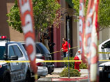 Там двое вооруженных злоумышленников убили в пиццерии двух полицейских, а потом застрелили женщину в крупном магазине