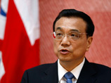 Китайский премьер обещает, что экономике страны удастся избежать "жесткой посадки"