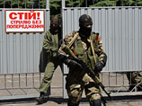 Сепаратисты на территории воинской части № 3023 в Донецке, взятой ими под контроль Сепаратисты на территории воинской части № 3023 в Донецке, взятой ими под контроль