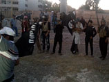 Боевики ИГИЛ казнили и прибили к крестам восьмерых сирийских ополченцев