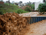 Праздничное настроение жителей Бразилии, которые принимают в своей стране Чемпионат мира по футболу, омрачило стихийное бедствие - наводнение, от которого страдает юг страны