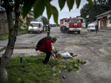 В Луганске, занятом сепаратистами, расстреляли маршрутку. Есть жертвы В Луганске, занятом сепаратистами, расстреляли маршрутку. Есть жертвы