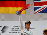Гонщик "Формулы-1" Росберг впервые победил на домашней трассе 