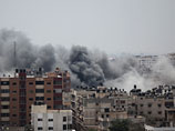 Дым после израильского авиаудара в секторе Газа, 21 июля 2014 года