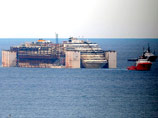 Лайнер Costa Concordia доставили к порт Генуи для утилизации

