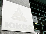 Ранее Третейский суд в Гааге фактически признал нефтекомпанию ЮКОС экспроприированной и оценил потери ее бывших акционеров в 49,9 млрд долларов Ранее Третейский суд в Гааге фактически признал нефтекомпанию ЮКОС экспроприированной и оценил потери ее бывших акционеров в 49,9 млрд долларов