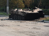 Уничтоженная бронетехника украинской армии на улице Шахтерска, 4 августа 2014 года Уничтоженная бронетехника украинской армии на улице Шахтерска, 4 августа 2014 года