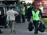 Эксперты и представители ОБСЕ работают на месте падения малайзийского авиалайнера Boeing 777, 3 августа 2014 года