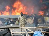 На Майдане в Киеве загорелись палатки, уборку сопровождают драки
