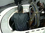 Российские водолазы тренируются перед началом операции по подъему тел подводников