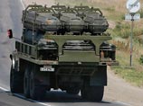 В объективы фоторепортеров попало несколько машин с контейнерами для ракет ЗРК "Бук", которые российские военные перевозят по направлению к границе Украины. Фотографии были сделаны агентством Reuters возле города Каменск-Шахтинский В объективы фоторепортеров попало несколько машин с контейнерами для ракет ЗРК "Бук", которые российские военные перевозят по направлению к границе Украины. Фотографии были сделаны агентством Reuters возле города Каменск-Шахтинский