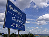 Украинские силовики утверждают, что подняли флаг над отделом милиции одного из районов Луганска Украинские силовики утверждают, что подняли флаг над отделом милиции одного из районов Луганска
