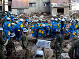 По меньшей мере 45 человек по-прежнему числятся пропавшими без вести после разрушительного оползня, который в ночь на среду разрушил несколько кварталов в японском городе Хиросима