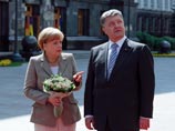 Канцлер Меркель прибыла в Киев, проводит переговоры с Порошенко Канцлер Меркель прибыла в Киев, проводит переговоры с Порошенко