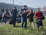 Более 45 тысяч беженцев, приехавших из юго-восточных районов Украины из-за вооруженных столкновений сепаратистов с армией, перевезены в российские регионы