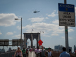 Нью-йоркская полиция арестовала россиянина, который взобрался на вершину Бруклинского моста, чтобы сделать несколько фотографий