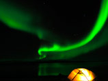 Фотограф заснял на ВИДЕО северное сияние над Лапландией