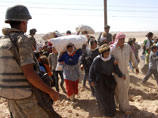 Несколько сотен сирийцев прибыли к границе Турции в районе провинции Шанлыурфа, спасаясь от боевых действий между террористами из ИГ и курдскими отрядами самообороны "пешмерга"