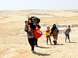 Международное сообщество призывает спасти сирийских курдов, которых убивают боевики "Исламского государства"