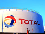 Total из-за санкций приостанавливает сотрудничество с "Лукойлом" Total из-за санкций приостанавливает сотрудничество с "Лукойлом"