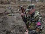 Наблюдатели ОБСЕ насчитали под Донецком три массовых захоронения с надписью на одном "Погибли за ложь Путина"