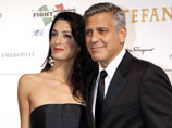 Джордж Клуни и Амаль Аламуддин, тайно поженившись в Венеции, показали всем кольца