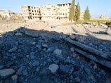 Здание завода по производству пластика после бомбардировки в сирийской провинции Ракка, 29 сентября 2014 года