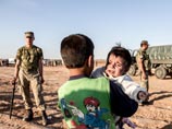 Боевики "Исламского государства" захватили большую часть иракского города Хит Боевики "Исламского государства" захватили большую часть иракского города Хит