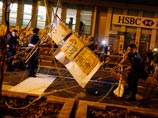 Полиция Гонконга убрала баррикады протестующих еще в одном районе Полиция Гонконга убрала баррикады протестующих еще в одном районе