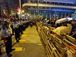 Полиция атаковала протестующих в Гонконге, десятки пострадавших Полиция атаковала протестующих в Гонконге, десятки пострадавших