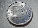 Днем в четверг рубль укрепился к доллару максимальными темпами с января 2010 года Днем в четверг рубль укрепился к доллару максимальными темпами с января 2010 года