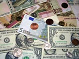 Доллар и евро дорожают в праздники на бирже: установленный ЦБ курс превышен  более чем  на 1,5  рубля
