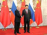 В ходе переговоров российской делегации, которую возглавляет президент Владимир Путин, с лидером Китая Си Цзиньпином, которые состоялись перед форумом АТЭС, был подписан "огромный пакет документов"