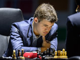 Карлсен победил Ананда и вышел вперед в споре за шахматную корону 