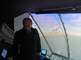 Владимир Путин во время осмотра строящегося океанариума на острове Русский, 13 ноября 2014 года