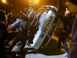 Более 400 человек арестованы в США с начала протестов после оправдания полицейского в Фергюсоне 