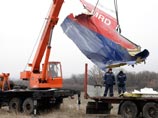Автоколонна с обломками малайзийского Boeing, разбившегося на Украине, прибыла в Нидерланды Автоколонна с обломками малайзийского Boeing, разбившегося на Украине, прибыла в Нидерланды