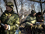 Украинские власти называют "террористами" вооруженных людей, которые захватили власть в Луганской и Донецкой областях и провозгласили на подконтрольных территориях соответственно Луганскую и Донецкую "народные республики"