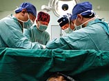 Несколько хирургов и медсестер из больницы Сиань в провинции Шаньси (центр Китая) были наказаны за фотоснимки, сделанные прямо во время операции, до наложения швов Несколько хирургов и медсестер из больницы Сиань в провинции Шаньси (центр Китая) были наказаны за фотоснимки, сделанные прямо во время операции, до наложения швов