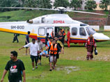 Премьер Малайзии не видит проблемы в игре в гольф во время наводнения - визит к Обаме было "поздно отменять"