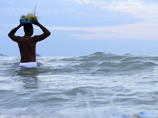Жертвами удара молнии на бразильском пляже стали четыре человека, в том числе и беременная девушка