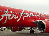 Спасатели: в районе поисков пропавшего самолета AirAsia замечен дым Спасатели: в районе поисков пропавшего самолета AirAsia замечен дым