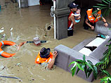 По меньшей мере 30 человек погибли и свыше 10 пропали без вести 29 декабря в результате наводнений и оползней, вызванных тропическим ураганом "Сеньянг"